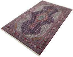 Corner detail of 2000s Sarough rug showing border pattern and Cork pile