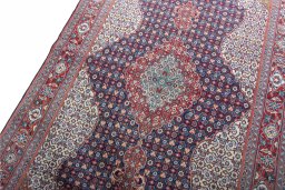 Backside of handmade 2000s Sarough rug showing knot structure and weave density