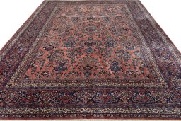 Surface texture of 1930s Sarough rug with natural Cork and intricate pattern