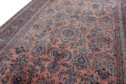 Backside of handmade 1930s Sarough rug showing knot structure and weave density