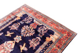 Surface texture of 2000s Sarough rug with natural Wool and intricate pattern