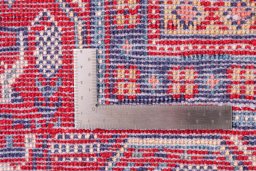 Close-up detail of 1975s Sarough rug from Iran / Persia showing Wool weave