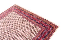 Surface texture of 1975s Sarough rug with natural Wool and intricate pattern