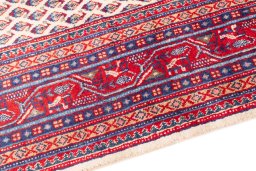 Backside of handmade 1975s Sarough rug showing knot structure and weave density