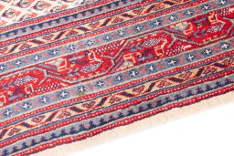 Backside of handmade 1975s Sarough rug showing knot structure and weave density