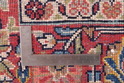 Close-up detail of 1975s Sarough rug from Iran / Persia showing Wool weave
