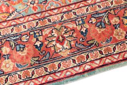 Backside of handmade 1975s Sarough rug showing knot structure and weave density