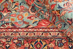 Corner detail of 1975s Sarough rug showing border pattern and Wool pile