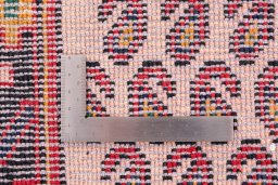 Corner detail of 1970s Sarough rug showing border pattern and Wool pile