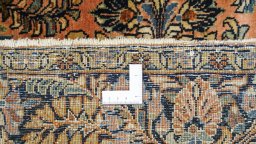Corner detail of 1920s Sarough rug showing border pattern and Wool pile