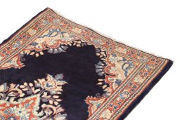 Surface texture of 1990s Sarough rug with natural Wool and intricate pattern