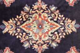 Close-up detail of 1990s Sarough rug from Iran / Persia showing Wool weave