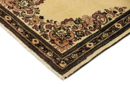 Backside of handmade New Sarough rug showing knot structure and weave density