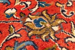 Backside of handmade New Sarough rug showing knot structure and weave density