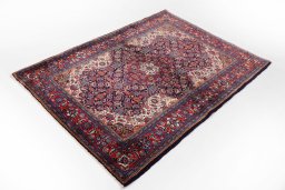 Close-up detail of 1990s Sarough rug from Iran / Persia showing Wool weave
