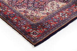 Backside of handmade 1990s Sarough rug showing knot structure and weave density