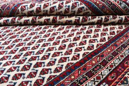 Close-up detail of 2000s Sarough Mir rug from Iran / Persia showing Wool weave