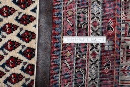 Surface texture of 2000s Sarough Mir rug with natural Wool and intricate pattern