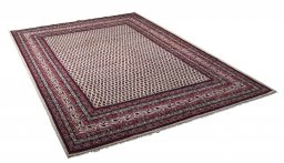 Corner detail of 2000s Sarough Mir rug showing border pattern and Wool pile