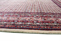 Close-up detail of 2000s Sarough Mir rug from Iran / Persia showing Wool weave