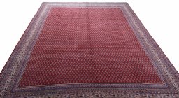 Surface texture of 2000s Sarough Mir rug with natural Wool and intricate pattern