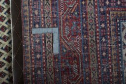 Close-up detail of 2000s Sarough Mir rug from Iran / Persia showing Wool weave