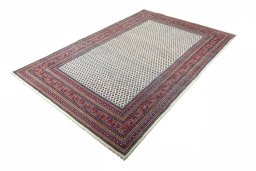 Corner detail of 2000s Sarough Mir rug showing border pattern and Wool pile