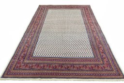 Surface texture of 2000s Sarough Mir rug with natural Wool and intricate pattern