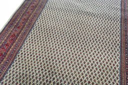Backside of handmade 2000s Sarough Mir rug showing knot structure and weave density