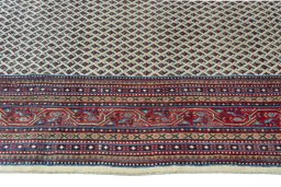 Close-up detail of 2000s Sarough Mir rug from Iran / Persia showing Wool weave
