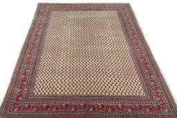 Surface texture of 2000s Sarough Mir rug with natural Wool and intricate pattern