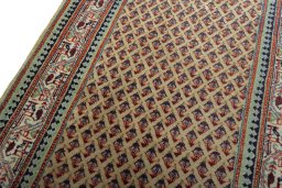Backside of handmade 2000s Sarough Mir rug showing knot structure and weave density