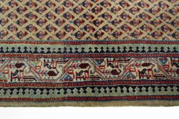 Close-up detail of 2000s Sarough Mir rug from Iran / Persia showing Wool weave