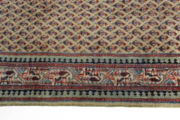 Close-up detail of 1970s Sarough Mir rug from Iran / Persia showing Wool weave