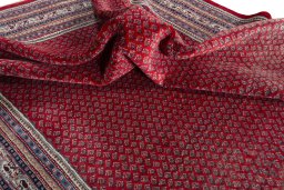 Corner detail of 2000s Sarough Mir rug showing border pattern and Wool pile