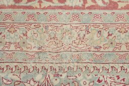 Corner detail of 1920s Tabriz rug showing border pattern and Wool pile
