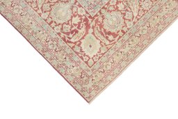 Backside of handmade 1920s Tabriz rug showing knot structure and weave density