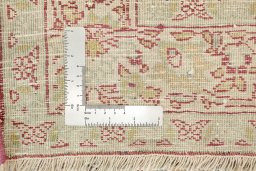 Close-up detail of 1920s Tabriz rug from Iran / Persia showing Wool weave