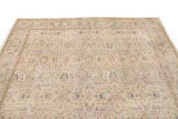 Surface texture of 1920s Tabriz rug with natural Wool and intricate pattern