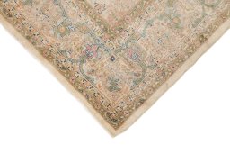 Backside of handmade 1920s Tabriz rug showing knot structure and weave density