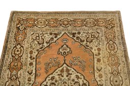 Surface texture of 1900s Tabriz rug with natural Wool and intricate pattern