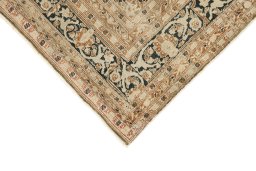 Backside of handmade 1900s Tabriz rug showing knot structure and weave density