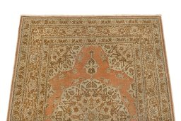 Surface texture of 1900s Tabriz rug with natural Wool and intricate pattern