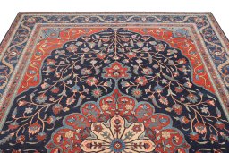 Surface texture of 1900s Tabriz rug with natural Wool and intricate pattern