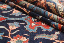 Close-up detail of 1900s Tabriz rug from Iran / Persia showing Wool weave