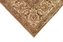 Backside of handmade 1950s Tabriz rug showing knot structure and weave density