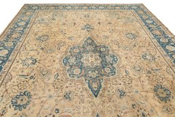 Surface texture of 1920s Tabriz rug with natural Wool and intricate pattern
