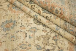 Full view of 1900s Tabriz rug from Iran / Persia, 418 × 300 cm in Cream tones