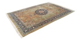 Corner detail of 1980s Tabriz rug showing border pattern and Wool pile