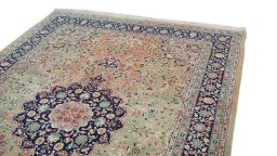 Backside of handmade 1980s Tabriz rug showing knot structure and weave density
